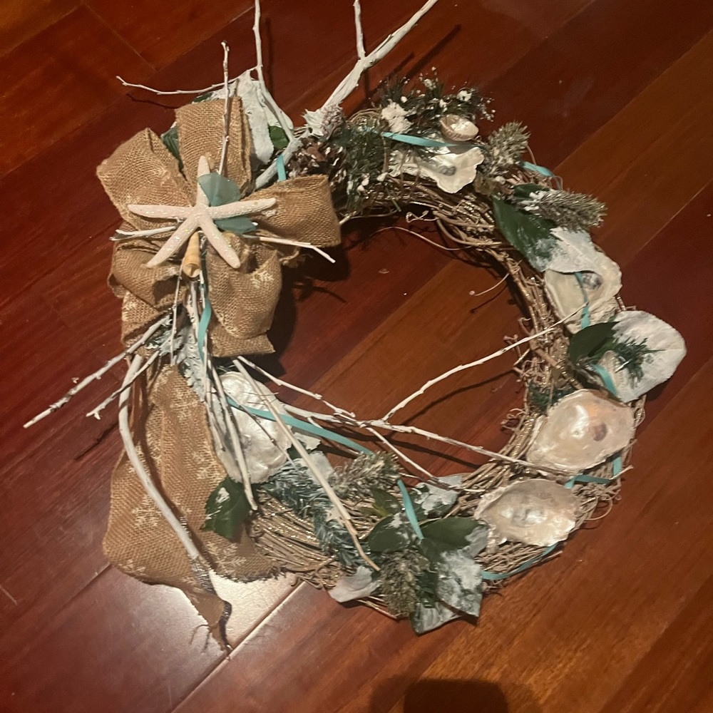 Nautical themed winter wonderland wreath embellished with glazed oyster shells